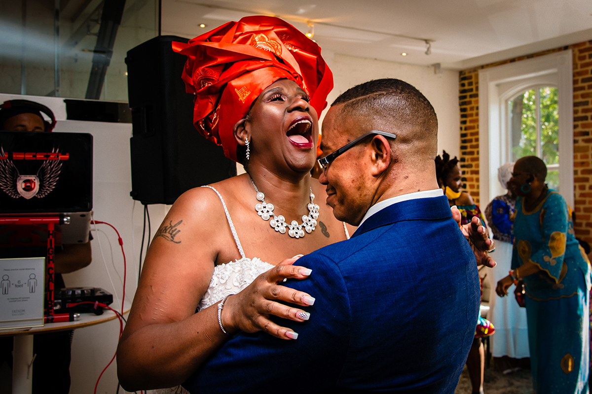First dance at wedding reception during Fathom Gallery micro wedding by DC wedding photographers of Potok's World Photography