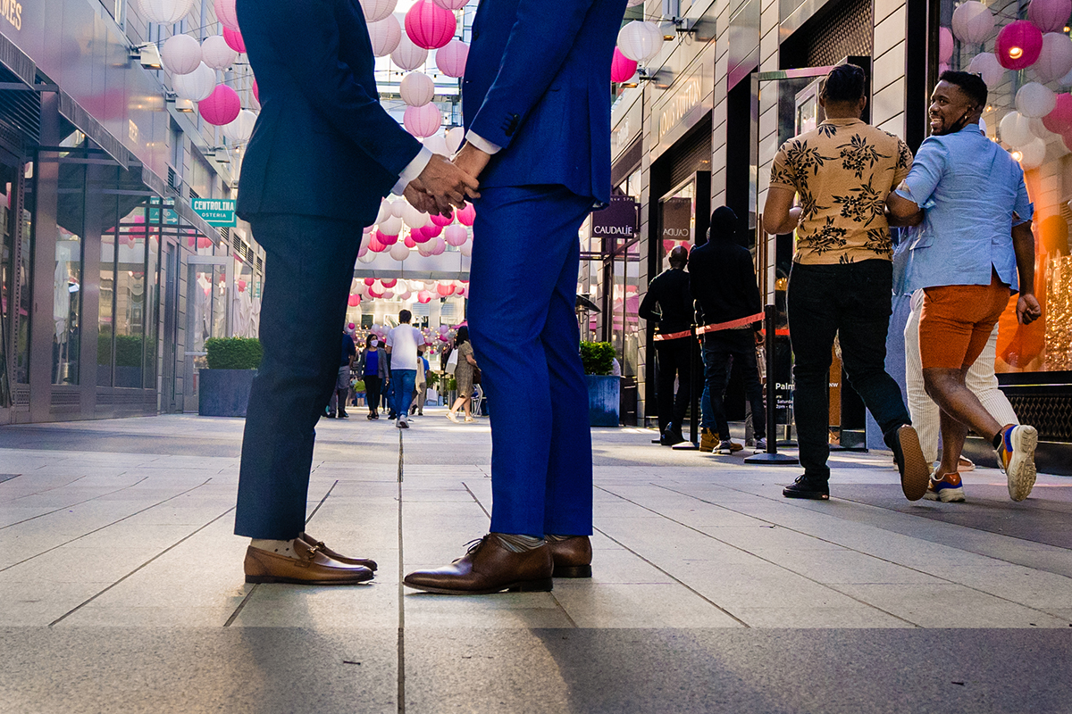 Groom and groom portrait at the City Center in DC before wedding ceremony at the Conrad hotel by Potok's World Photography