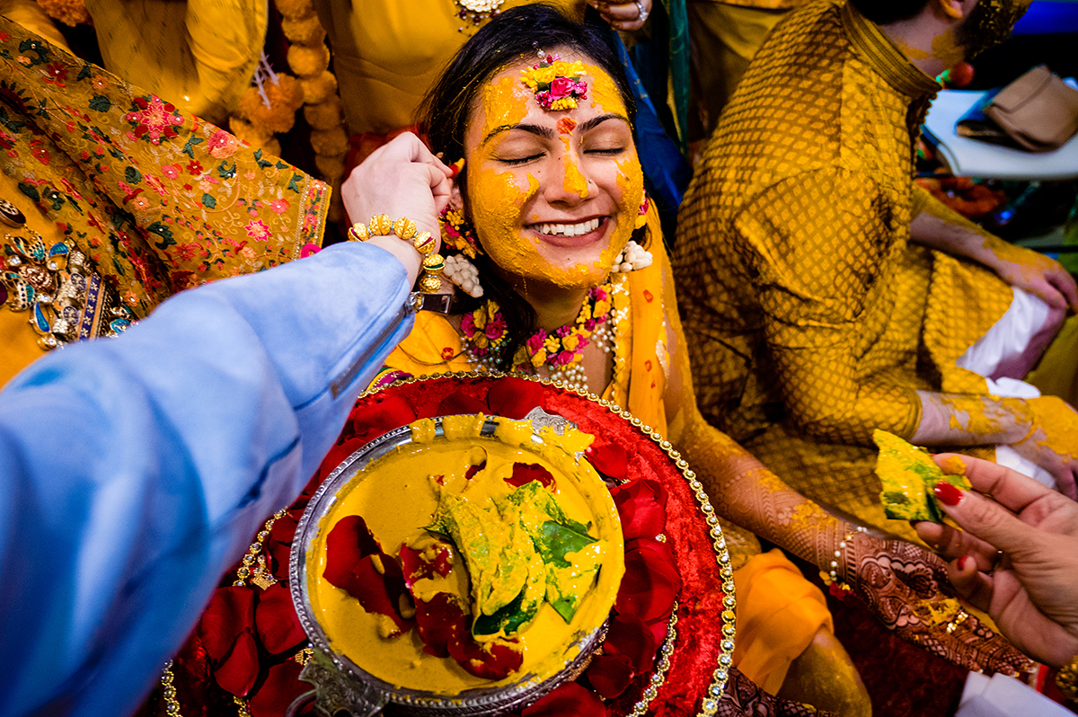 Bride at her Haldi ceremony in northern Virginia by DC wedding photographers of Potok's World Photography