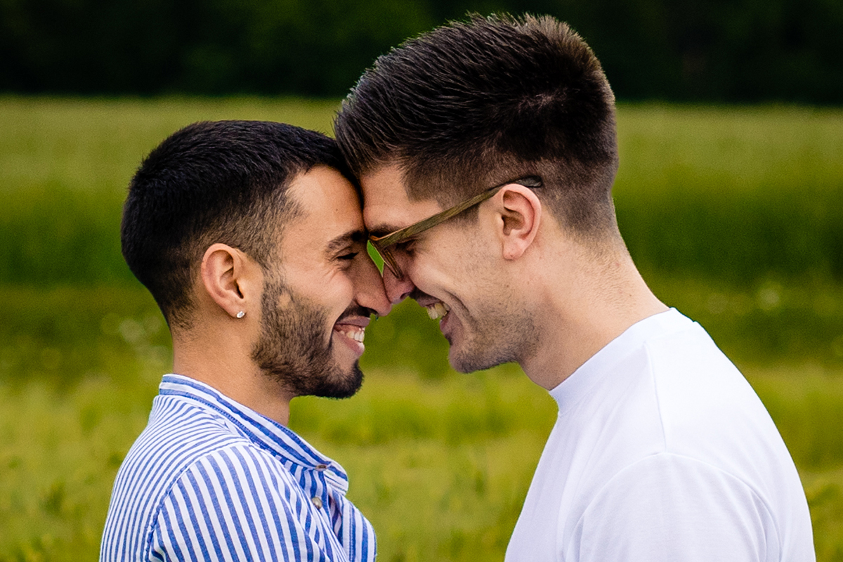 Same sex summer engagement session in a lush green field in northern Germany by Potok's World Photography