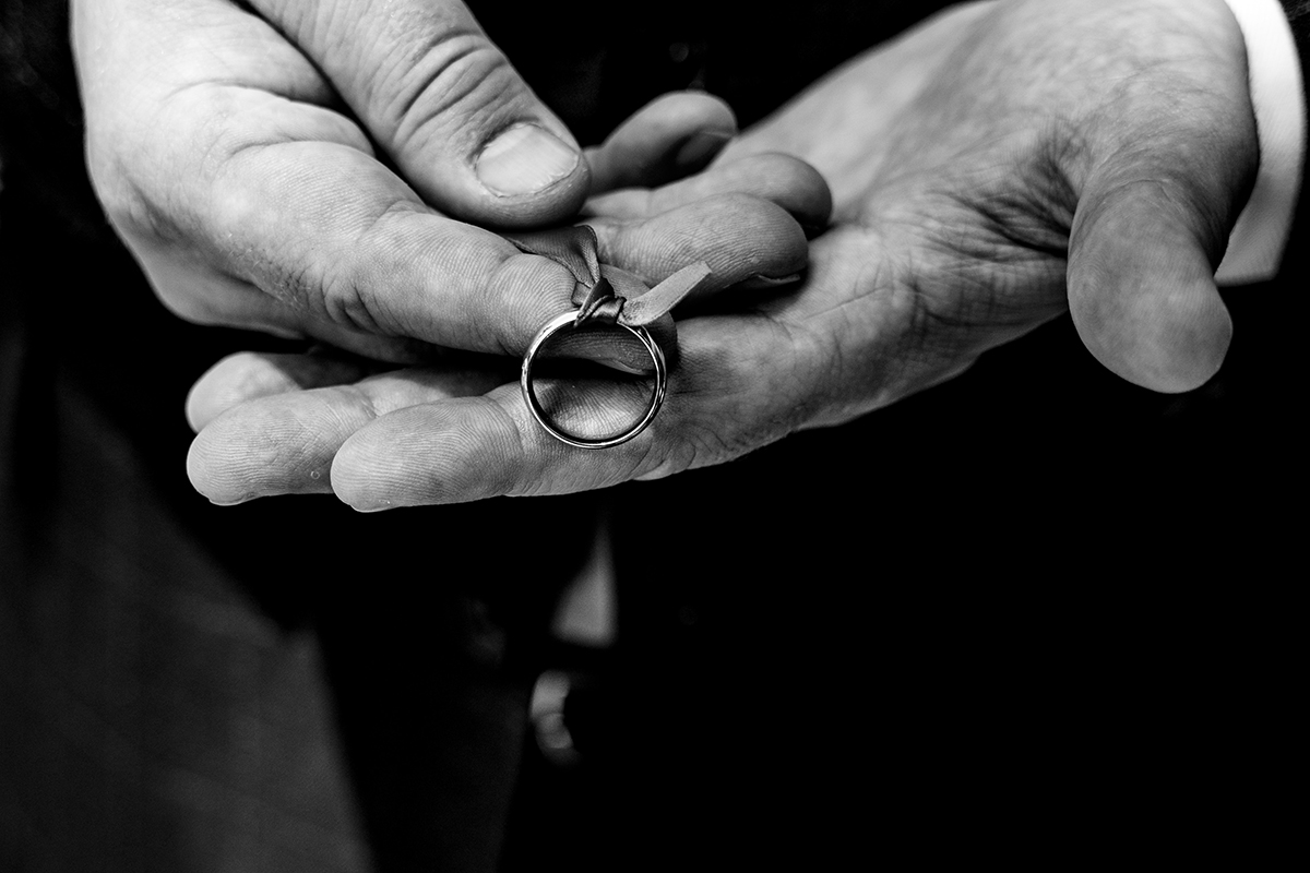 Old Town Alexandria Virginia wedding ceremony with best man holding the wedding ring by DC wedding photographer of Potok's World Photography
