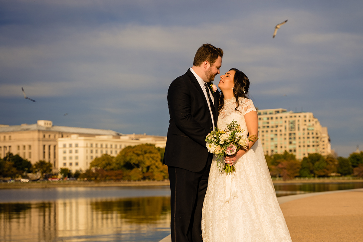 Wedding portraits of the bride and groom at the Tidal Basin by DC wedding photographers of Potok's World Photography