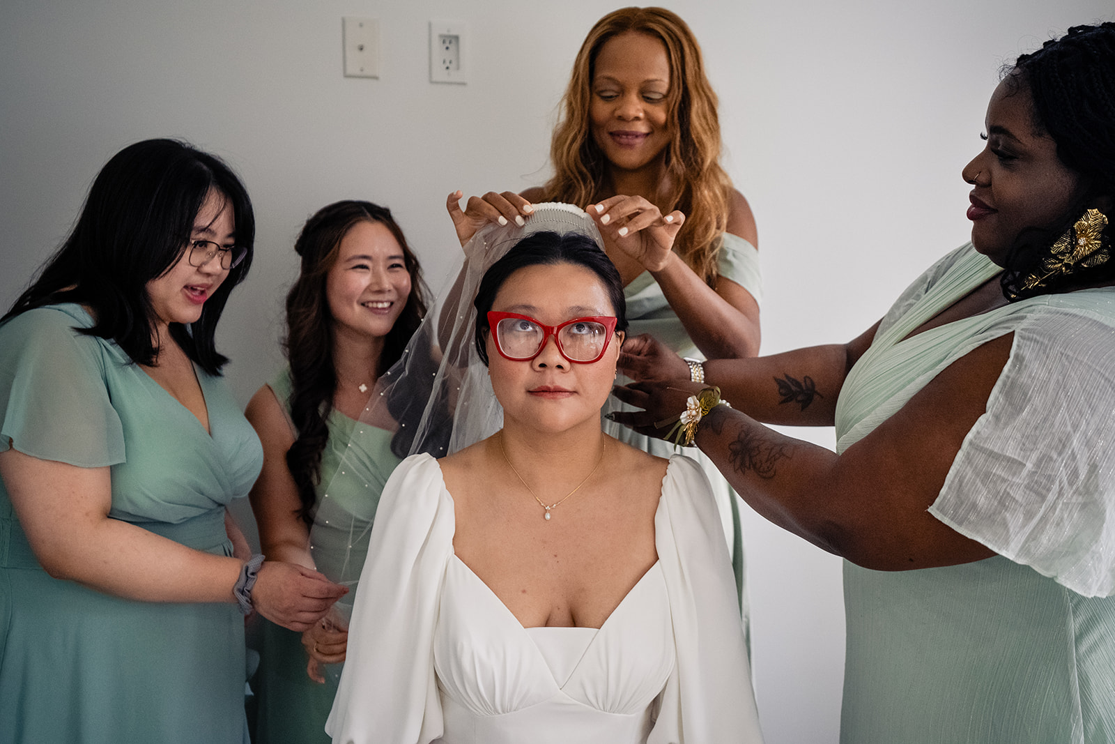 Bride getting ready with her wedding party in the bridal suite at Fathom Gallery 14th Street in DC